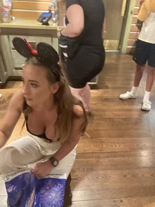 Dirty blond with her cleavage out at Disneyland