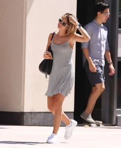 Sarah Hyland showing pokies while braless in a dress