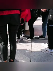 Ass in leather pants closeups on the street