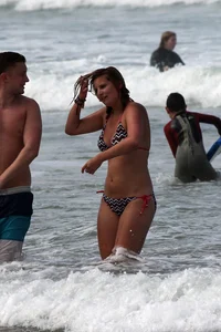 Sexy bikini babe with nice body in the water