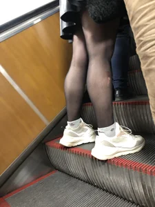 Redhead Girl in a Leather Dress And Black Pantyhose - Sexy Legs Closeup on the Subway Escalator Creepshots Gallery