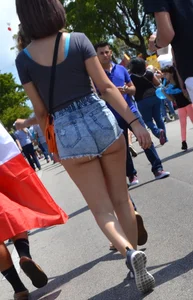 Thick booty babe in denim shorts showing her cheeks