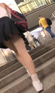 Candid girl in a skirt, low angle creepshots in a subway