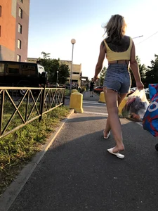 Candid Girl in a Top, Jean Shorts And Slippers - Stocky Legs And Blackwork Tattoo on Her Back