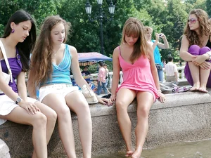 Pink skirt girl upskirted at fountain