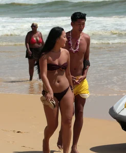 Sexy Asian on the beach with nice boobs and ass
