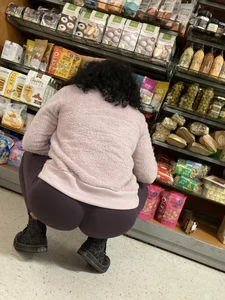 Fit milf doing big bends/squats