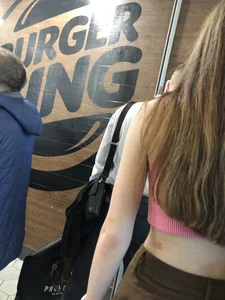 Extremely cute teen in a fast food restaurant