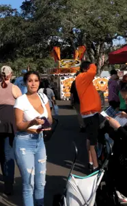 Huge tits in a low cut white top and tight jeans