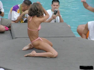 Beach voyeur girls in bikinis, thongs and topless