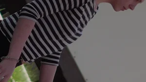 Strawberry blonde cutie showing stomach and in leggings