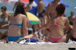 Beach voyeur girls in bikinis, thongs and topless