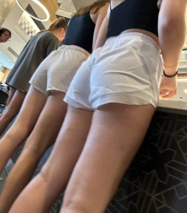 College girls lining up for lunch showing off