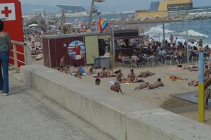 Topless girls on a beach in Barcelona
