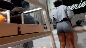 Candid ebony babe with an amazing ass and vpl in grey Nike spandex shorts
