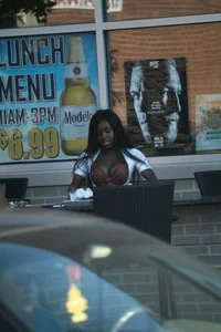 Sexy ebony Tilted Kilt employee in her uniform