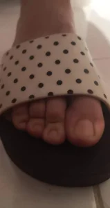 Closeup Creepshot of a Girl's Foot in a Slipper