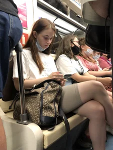 Cute Teen Girl With Hot Crossed Legs in Tight Shorts And Slippers Subway Creepshots
