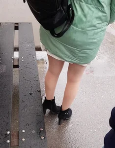 Closeups of a candid girl's legs on the street, high heels