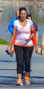 Thick lady walking in leggings with a big booty