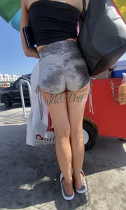 Milf with cheeks out and “Wild” tattoo