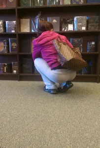 Candid teen in sweatpants at the bookstore
