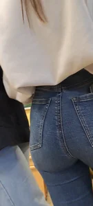 Girl is showing her blue jeans