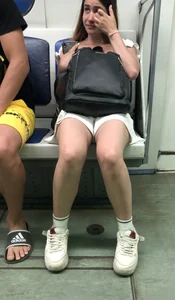 Cute Sleepy Girl in Shorts Asleep in Subway Candid Photos