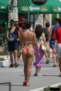 Beach voyeur girls in bikinis, thongs and topless