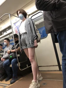 Cute Girl in Shorts and Sneakers With Hot Legs in Subway Train Creepshots Gallery