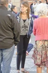 Pretty curly haired girl in tight leggings
