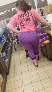 Fat booty milf in purple leggings at the grocery store