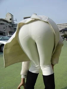Girl in White Tight Pants Bending Over on the Street Creepshot