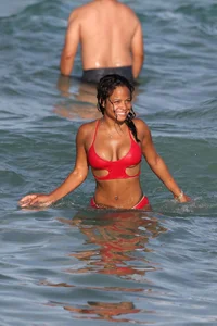 Christina Milian in red bikini in Miami with hard nipples