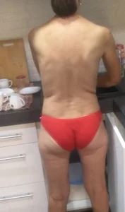 Topless wife in red panties home creepshot at the kitchen