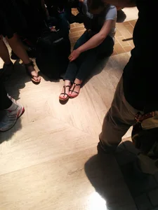 Candid Girl With Cute Feet in Sandals Sitting on the Floor Creepshot