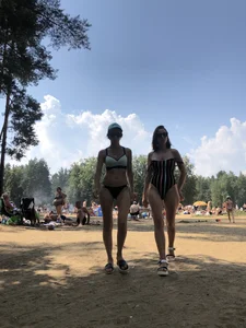 Two Gorgeous Girls in Swimsuits Passing By at a Beach