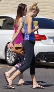 Sexy blonde and friend walking in leggings