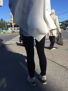 Blonde Girl With Fit Muscular Legs in Tight Black Jeans and Sneakers on a Crosswalk  - Street Creepshots Collection