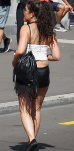 Girl out in tiny little leather shorts with a decent ass