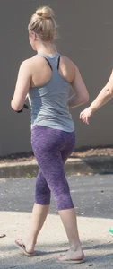 Sexy blonde out walking in purple leggings with a nice ass