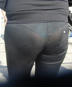 See through black pants showing girls blue thong
