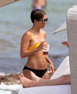Frankie Bridge nip slips in a bikini on the beach