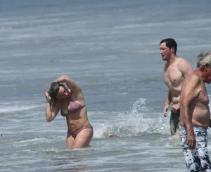 Hilary Duff in purple bikini in Malibu with a great ass and hard nipples