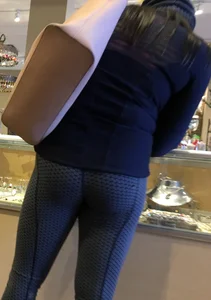 Brunette jewelry shopping in leggings with a nice ass