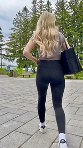 Blonde College Girl In Leggings Girl Keeps Touching Her Booty