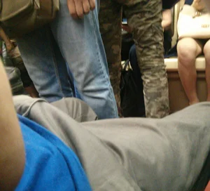 Blonde with Pale Skin and Hot Legs Sitting in Subway Train