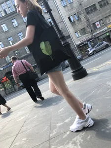 Candid Teen in Denim Shorts And Sneakers With Slim Legs Street Photos