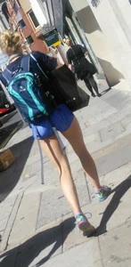 Blonde babe walking in blue spandex shorts