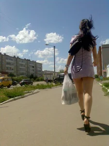 Stocky Milf Walking with Grocery Bag on Heels and in Short Dress